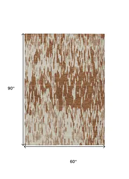 5' X 8' Orange And Ivory Abstract Washable Indoor Outdoor Area Rug