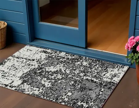 3' X 5' Black And Ivory Abstract Washable Indoor Outdoor Area Rug