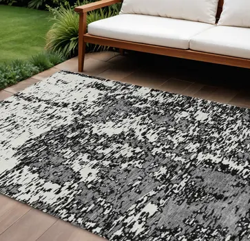10' X 14' Black And Ivory Abstract Washable Indoor Outdoor Area Rug