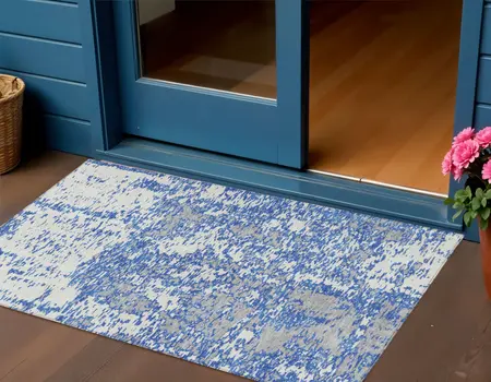 3' X 5' Blue And Ivory Abstract Washable Indoor Outdoor Area Rug