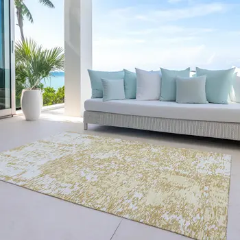 9' X 12' Gold And Ivory Abstract Washable Indoor Outdoor Area Rug