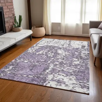 10' X 14' Lavender And Ivory Abstract Washable Indoor Outdoor Area Rug