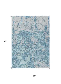 5' X 8' Teal Blue And Ivory Abstract Washable Indoor Outdoor Area Rug