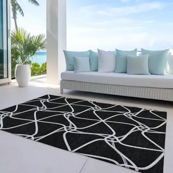 5' X 8' Black And Ivory Geometric Washable Indoor Outdoor Area Rug