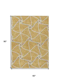 5' X 8' Gold And Ivory Geometric Washable Indoor Outdoor Area Rug