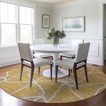 8' Gold And Ivory Round Geometric Washable Indoor Outdoor Area Rug