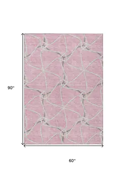 5' X 8' Pink And Ivory Geometric Washable Indoor Outdoor Area Rug