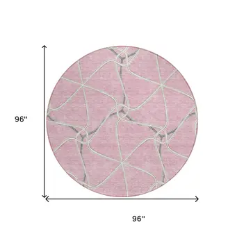 8' Pink And Ivory Round Geometric Washable Indoor Outdoor Area Rug