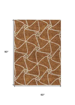 5' X 8' Orange And Ivory Geometric Washable Indoor Outdoor Area Rug