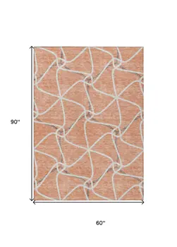 5' X 8' Salmon And Ivory Geometric Washable Indoor Outdoor Area Rug