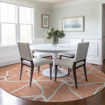 8' Salmon And Ivory Round Geometric Washable Indoor Outdoor Area Rug