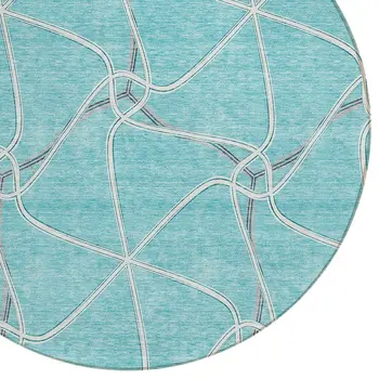 8' Teal Blue And Ivory Round Geometric Washable Indoor Outdoor Area Rug