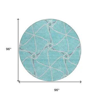 8' Teal Blue And Ivory Round Geometric Washable Indoor Outdoor Area Rug