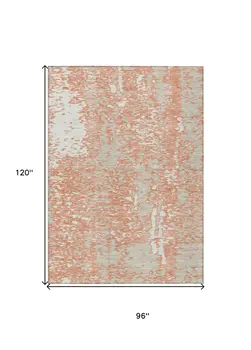 8' X 10' Coral And Ivory Abstract Washable Indoor Outdoor Area Rug