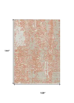 9' X 12' Coral And Ivory Abstract Washable Indoor Outdoor Area Rug