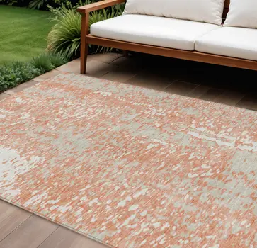 10' X 14' Coral And Ivory Abstract Washable Indoor Outdoor Area Rug