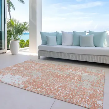 10' X 14' Coral And Ivory Abstract Washable Indoor Outdoor Area Rug