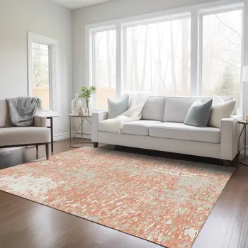 10' X 14' Coral And Ivory Abstract Washable Indoor Outdoor Area Rug