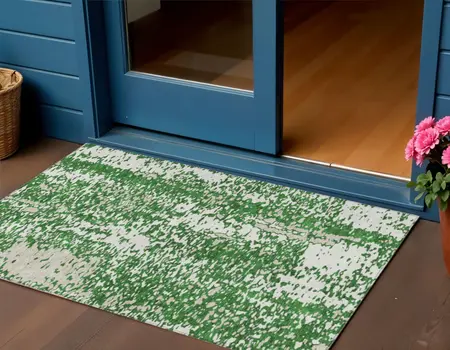 3' X 5' Emerald And Ivory Abstract Washable Indoor Outdoor Area Rug