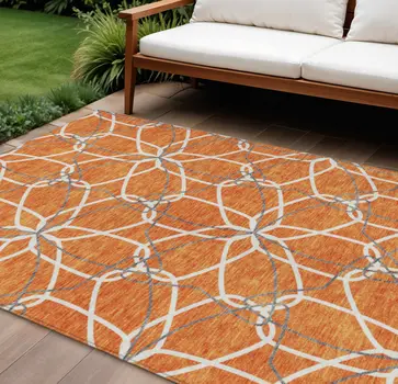 10' X 14' Orange And Ivory Geometric Washable Indoor Outdoor Area Rug