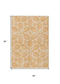 5' X 8' Peach And Ivory Geometric Washable Indoor Outdoor Area Rug