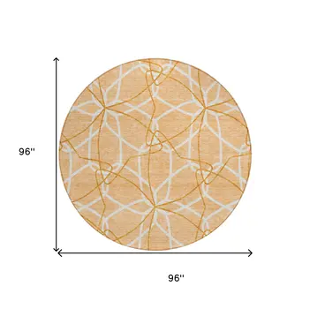 8' Peach And Ivory Round Geometric Washable Indoor Outdoor Area Rug