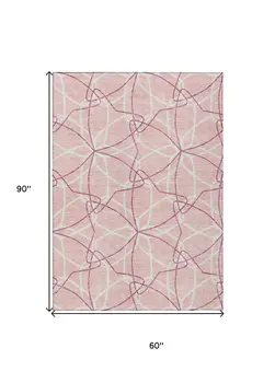 5' X 8' Pink And Ivory Geometric Washable Indoor Outdoor Area Rug