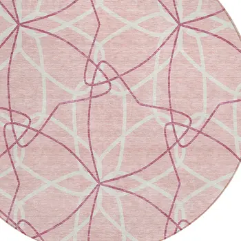 8' Pink And Ivory Round Geometric Washable Indoor Outdoor Area Rug