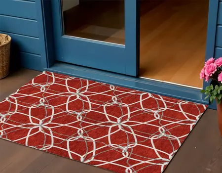 3' X 5' Red And Ivory Geometric Washable Indoor Outdoor Area Rug