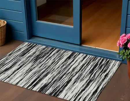 3' X 5' Black And Ivory Abstract Washable Indoor Outdoor Area Rug