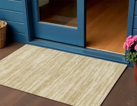 3' X 5' Gold And Ivory Abstract Washable Indoor Outdoor Area Rug