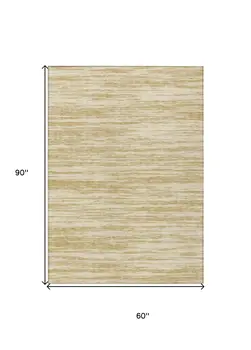 5' X 8' Gold And Ivory Abstract Washable Indoor Outdoor Area Rug