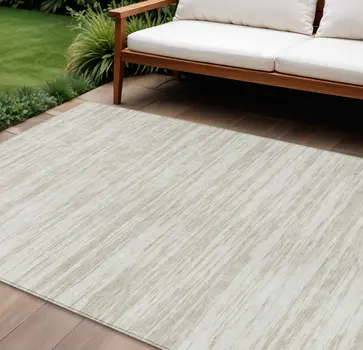 10' X 14' Ivory And Beige Abstract Washable Indoor Outdoor Area Rug