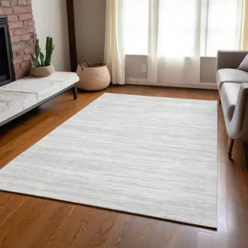 9' X 12' Silver And Ivory Abstract Washable Indoor Outdoor Area Rug