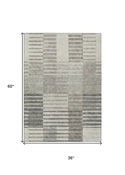 3' X 5' Beige Ivory And Taupe Striped Washable Indoor Outdoor Area Rug