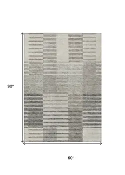5' X 8' Beige Ivory And Taupe Striped Washable Indoor Outdoor Area Rug