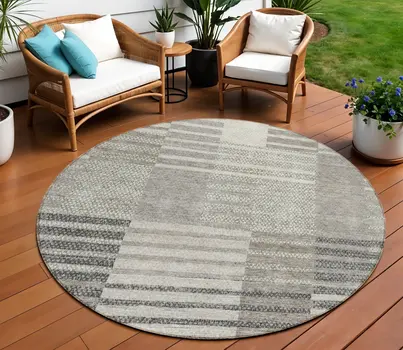 8' Beige Ivory And Taupe Round Striped Washable Indoor Outdoor Area Rug