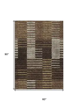 5' X 8' Chocolate Ivory And Gold Striped Washable Indoor Outdoor Area Rug