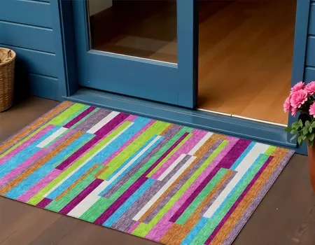 3' X 5' Lavender Orange And Lime Green Striped Washable Indoor Outdoor Area Rug