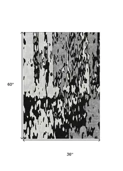 3' X 5' Black And Ivory Abstract Washable Indoor Outdoor Area Rug