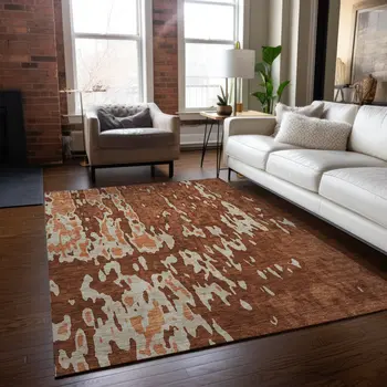 3' X 5' Orange And Ivory Abstract Washable Indoor Outdoor Area Rug