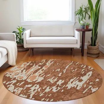 8' Orange And Ivory Round Abstract Washable Indoor Outdoor Area Rug