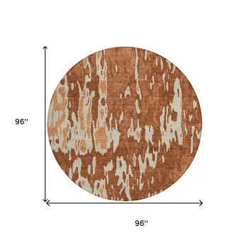8' Orange And Ivory Round Abstract Washable Indoor Outdoor Area Rug