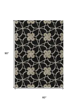 5' X 8' Black And Ivory Geometric Washable Indoor Outdoor Area Rug