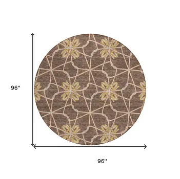 8' Brown And Gold Round Geometric Washable Indoor Outdoor Area Rug
