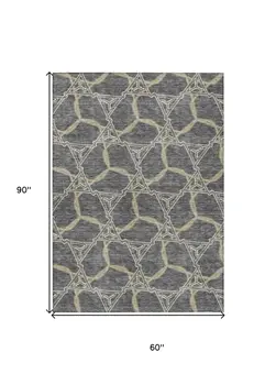 5' X 8' Charcoal And Gold Geometric Washable Indoor Outdoor Area Rug