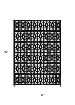 5' X 8' Black And Ivory Geometric Washable Indoor Outdoor Area Rug