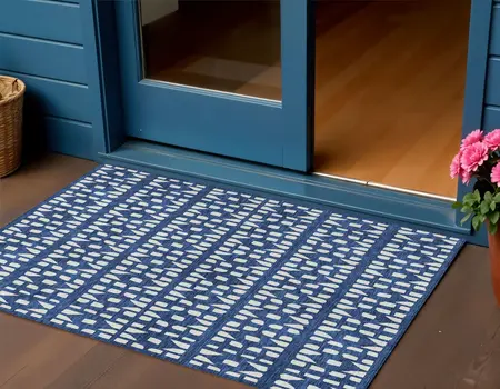 3' X 5' Navy Blue And Ivory Geometric Washable Indoor Outdoor Area Rug