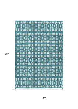 3' X 5' Teal Blue And Ivory Geometric Washable Indoor Outdoor Area Rug