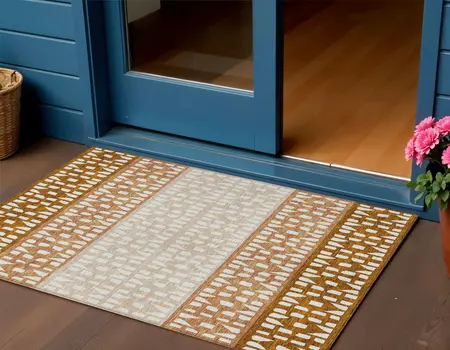 3' X 5' Orange Beige And Ivory Geometric Washable Indoor Outdoor Area Rug